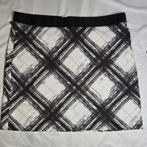 Greg Norman Black And White Golf Skort – Size 12, Comfort Waist, Slash Pockets